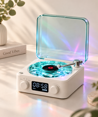 The Waves Vinyl Player on a desk with plants, ambient light on